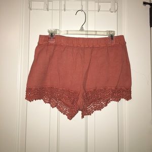 Burnt orange shorts for summer! Size large.